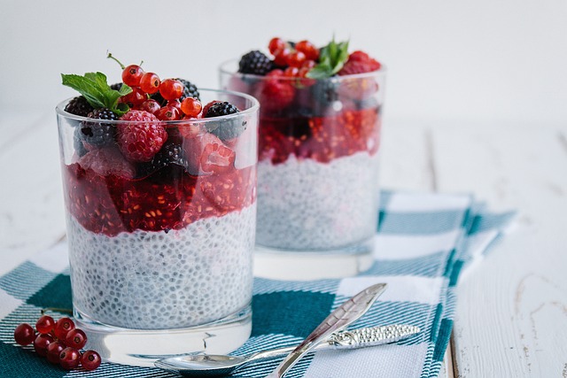 chia seed and yogurt parfaits topped with fresh berries